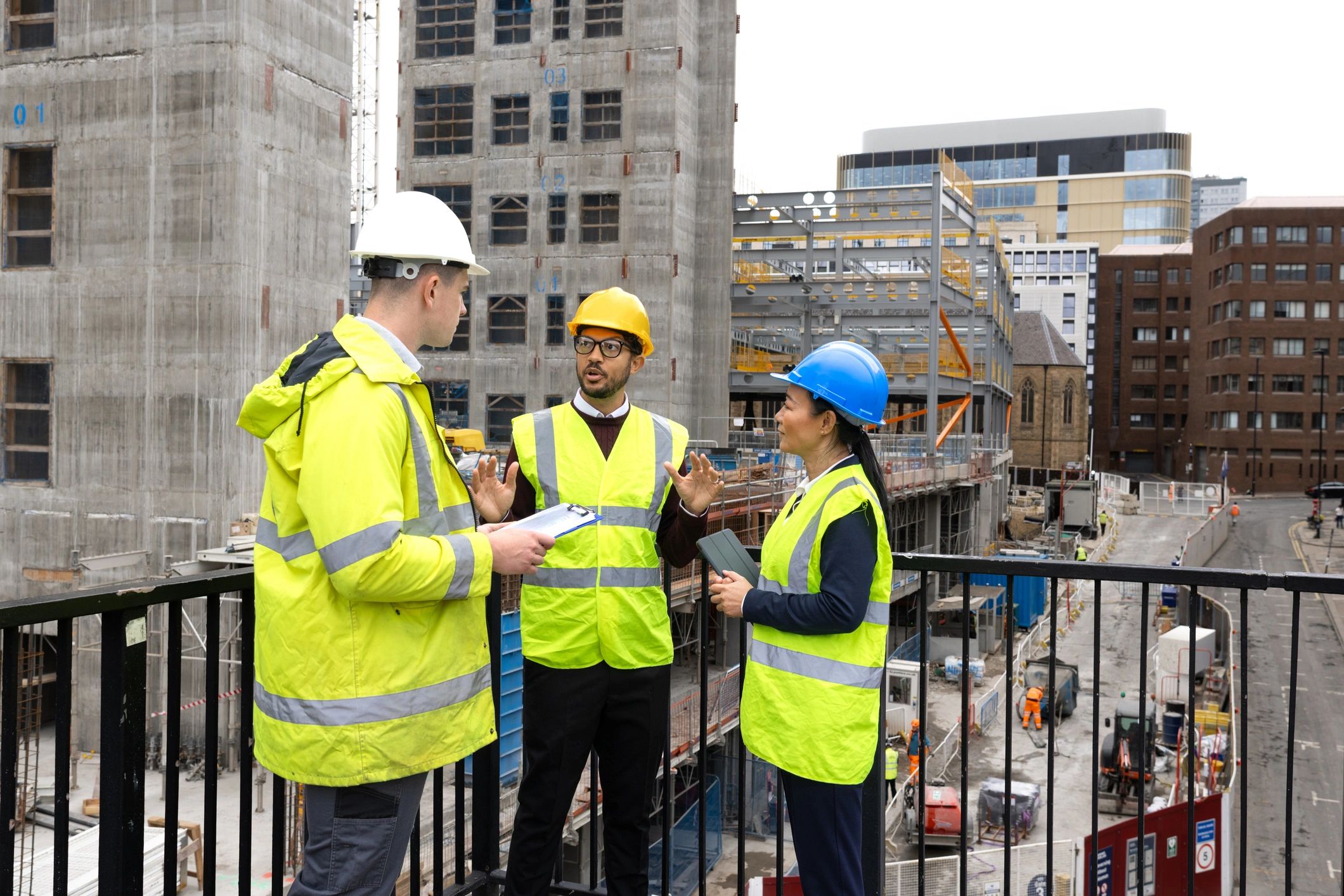 Roof inspection team discussing project details